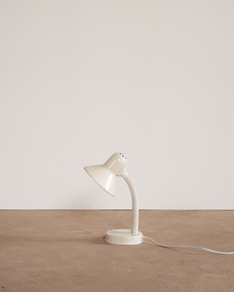 white shade lamp